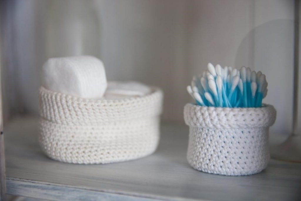 Cotton and earbuds kept in a bathroom