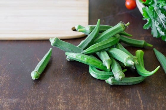 A bunch of okra lying on the table, as it is going to be used to make prints by dipping in paint